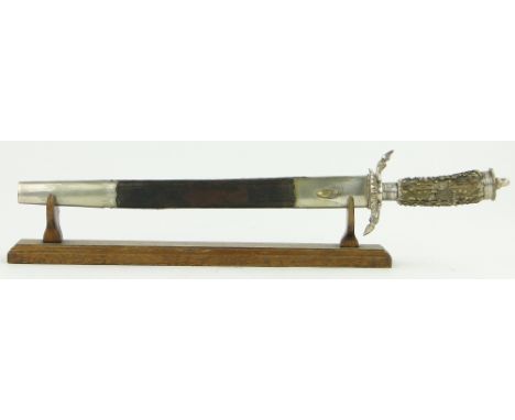 A German hunting knife with engraved stags and hounds on the blade,
and a stag horn handle, in scabbard with acorn decoration