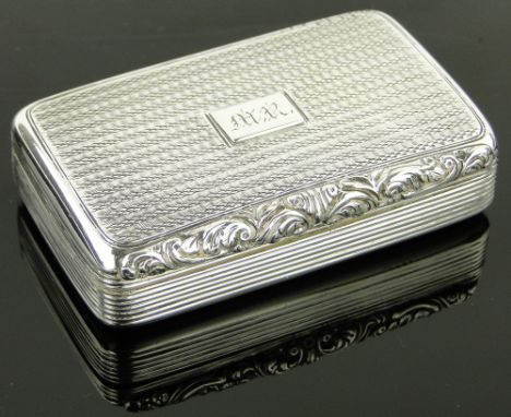 A George IV rectangular silver snuff box,
with scroll cast thumb piece, makers L & Co., Birmingham 1821, width 7cm.