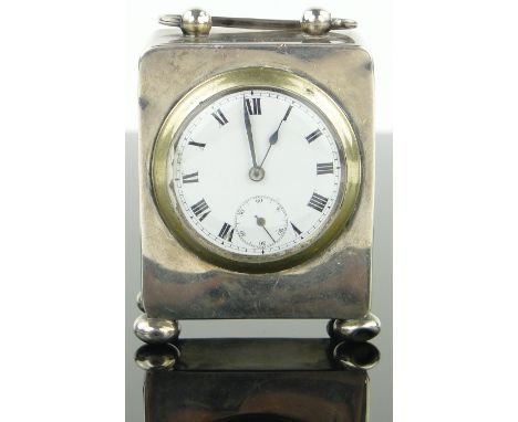 A silver cased carriage clock,
hallmarks Birmingham 1913, case height 65mm.