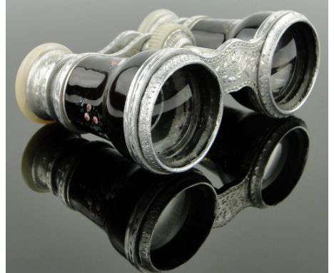 A pair of French enamel opera glasses,
decorated with cherubs.