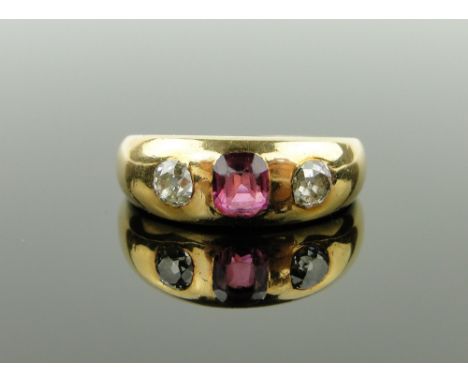 An 18ct gold 3 stone tourmaline and diamond ring,
hallmarks 1917, diamond content approx. 0.5cts total, size P.