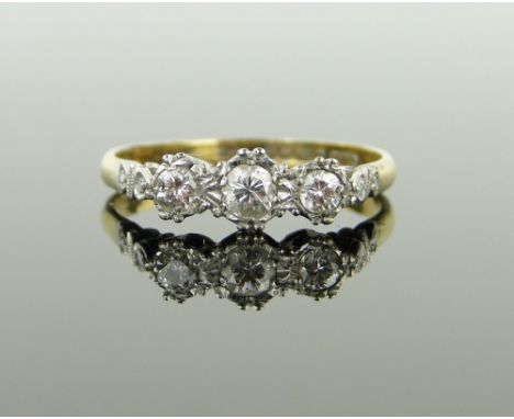 18ct gold 3 stone diamond ring, size R.