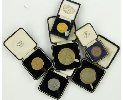 A 1939 silver Army Athletics javelin medal,
and other 1930s army sporting medallions, all cased.