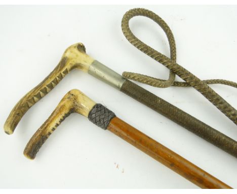 A Swaine & Adeney hunting crop with thong and horn handle,
and another horn handled riding crop, (2).