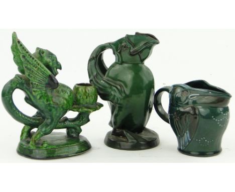 A Brannam Griffon figure candlestick, 6.75",
registration 44561, and 2 Brannam bird jugs, (3).
