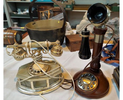 A 1960's gilt &amp; onyx telephone; a reproduction stick telephone 