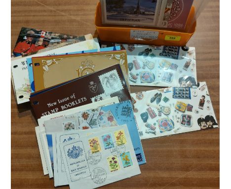 A collection of approximately 50 Isle of Man first day covers and a smaller selection of Beatles first day covers 