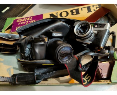 A Cannon E05 SLR camera; a Petri 35mm camera; camera bag, lenses, tripod etc 