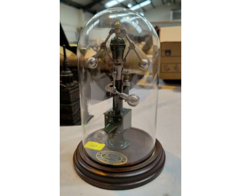 A steam powered engine under glass dome in green, scratch built 
