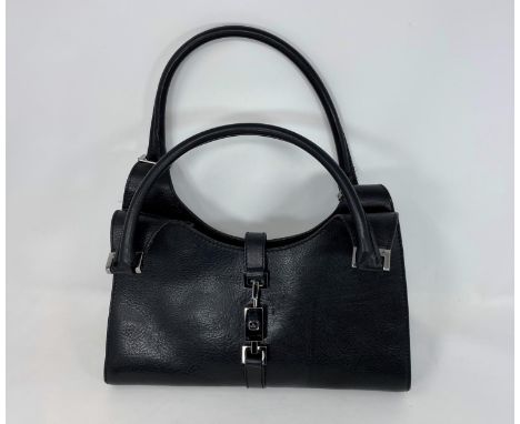 A Gucci black leather handbag with twin rolled handles and silver silver tone trim, zip pocket to interior 