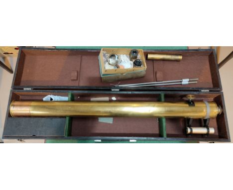A late 19th century/early 20th century 3" (7.5cm) diameter brass celestial telescope with accessories, spare eye pieces &amp;