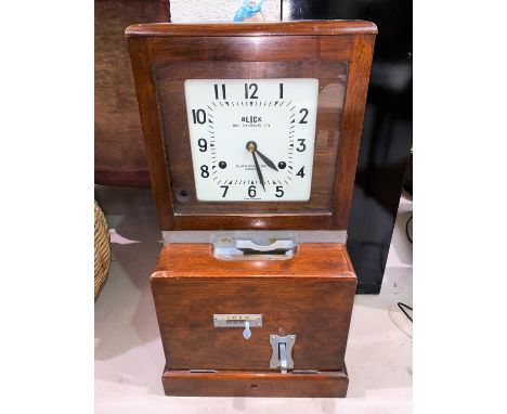 A Blick Time Recorder Ltd clocking in clock with original key height 70cm.&nbsp; Condition report:&nbsp;Looks to be in good c
