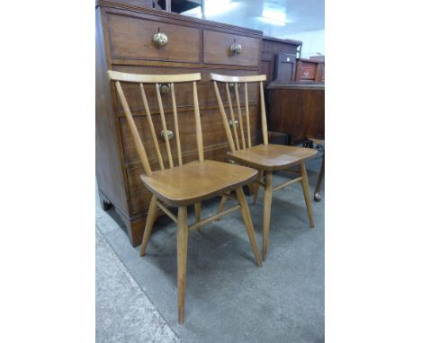 A pair of Ercol Blonde elm and beech 608 model chairs 