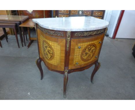 A French Louis XV style marquetry inlaid rosewood, gilt metal and marble topped demi lune petit commode 
