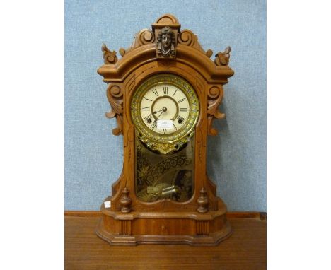 An American Ansonia Clock Co. beech shelf clock 
