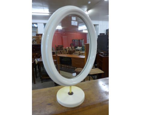 A vintage cream Perspex dressing table mirror 