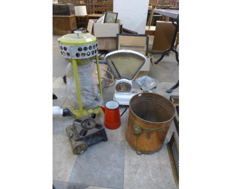 A set of Avery scales, a copper coal bucket, a paraffin heater, etc. 