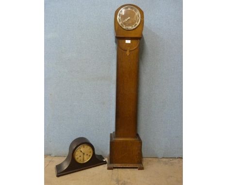 An oak dwarf case clock and an art deco oak mantel clock 
