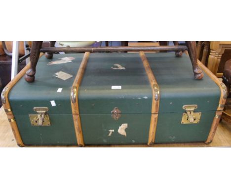 A wood banded green finished traveling trunk