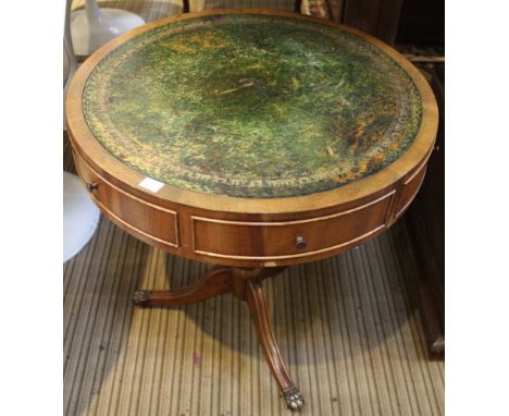 A reproduction drum table on tripod legs and inset skiver top a/f