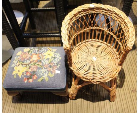 A tapestry top low mahogany foot stool with a child's wicker chair