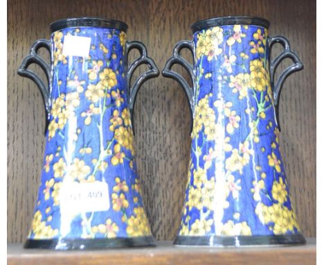 A pair of Royal Doulton blue and brown ceramic glazed floral vases