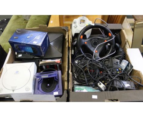 Five games consoles: PS2, X Box, Dreamcast, GameCube and a PSP with various controllers and connections. Some minor issues li