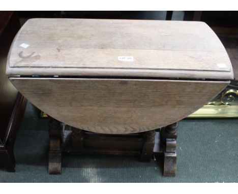 A small oak gate leg occasional table