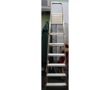 A set of six tread aluminium folding step ladders by Titan