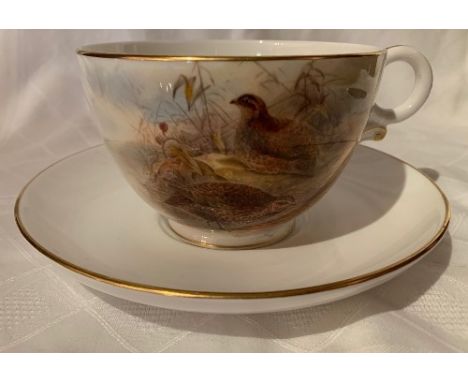 A Royal Worcester breakfast, or over-sized, cup and saucer decorated with quail by Jas Stinton, circa 1929Condition Report:  