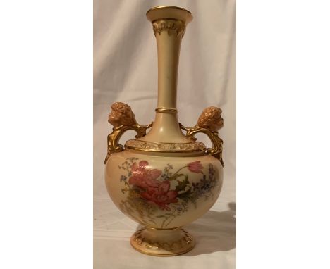 A Royal Worcester blush ivory vase, decorated with flowers, having two gilt mask handles, shape number 1956, circa 1904, heig