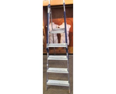 A 5 tread metal step ladder