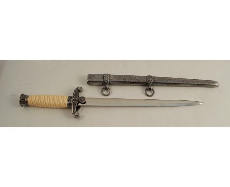 A WWII style German Army Officer's dagger and scabbard, marked F W Holler, Berlin to blade, oak leaf decoration to hilt, guar