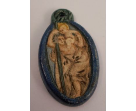 A Compton Art Pottery, attributed, a Saint Christopher pendant, unmarked, 4.8cm longCondition Report:  Scratches and scuffs, 