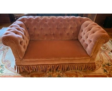 A drop-end Chesterfield, with deep button upholstery, width 63ins