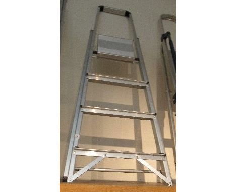 A four tread metal step ladder