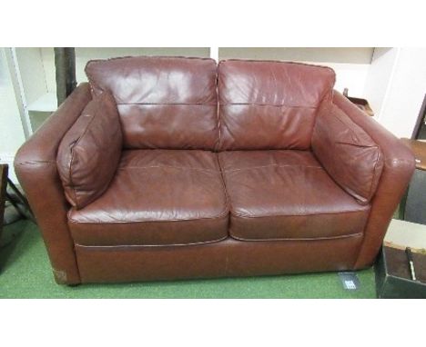 A leather two seater sofa, width 60ins approx