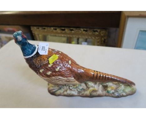 A BESWICK MODEL OF A PHEASANT, HEIGHT 8INS