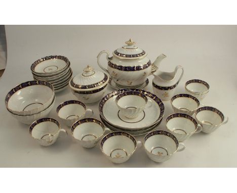 A 19th century Barr Worcester part tea service, comprising tea pot and stand, covered sugar bowl, jug, two slop bowls, nine s