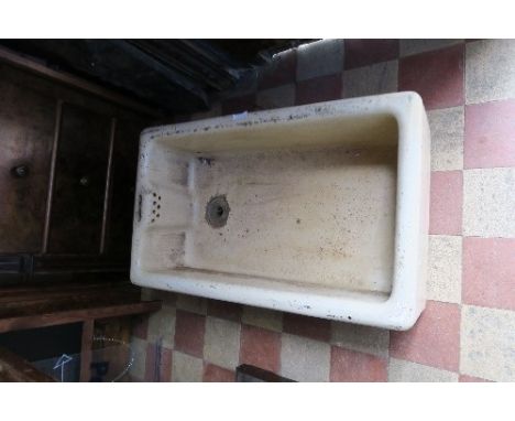 A rectangular garden trough, 42ins x 16.5ins x 7.25ins, together with a kitchen sink