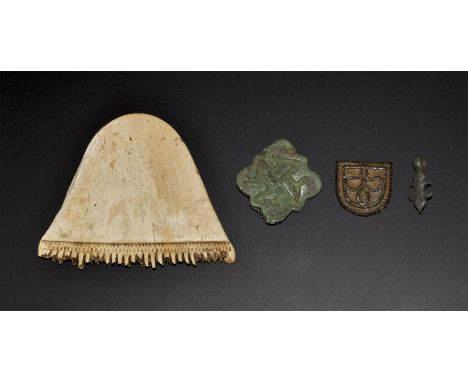10th-15th century AD. A mixed group comprising: a bone comb with zigzag ornament; a D-shaped plaque with trefoil ornament; a 