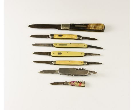 20th century AD. A mixed group of penknives comprising: one with commemorative 'Queen Elizabeth II Coronation' motif; three w