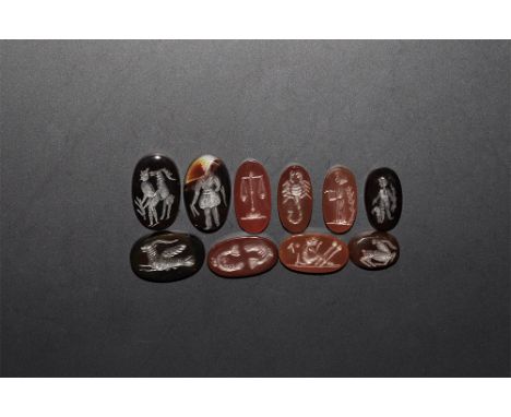 . A mixed group of undated archaistic intaglios with various images including scales (Libra), fish (Pisces), scorpion (Scorpi