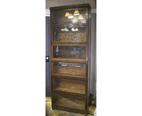 GLOBE WERNICKE BOOKCASE, mid 20th century oak in six glazed sections, 86cm W x 28cm D x 233cm H.