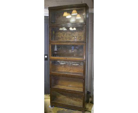 GLOBE WERNICKE BOOKCASE, mid 20th century oak in six glazed sections, 86cm W x 28cm D x 233cm H.