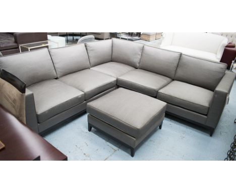 CORNER SOFA, by The Sofa and Chair Company, in grey fabric on square ebonised supports, 264cm x 264cm, with footstool. (2) (s