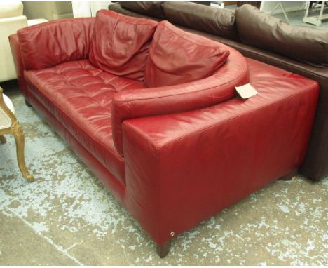 NATUZZI 'OSAKA' SOFA, with wine coloured leather upholstery, 200cm L x 70cm H. (with faults)