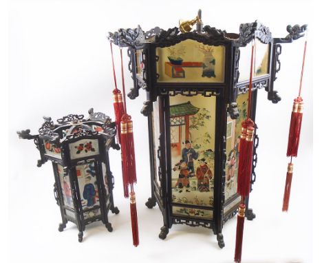 CHINESE LANTERN LIGHT, of hexagonal form, carved wood with painted glass panels hung with tassels, one clear, 73cm H x 68cm W