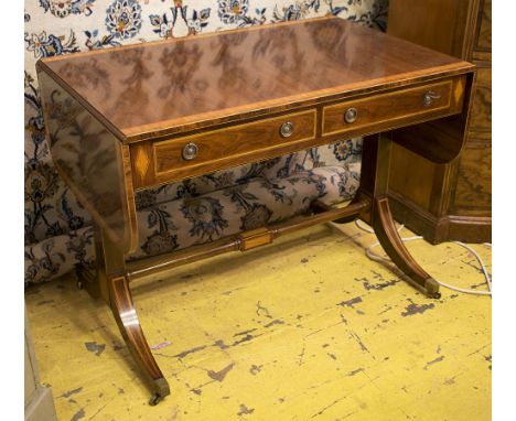 SOFA TABLE, Regency style rosewood and satinwood crossbanded with drop flaps and two short drawers below on swept feet with b