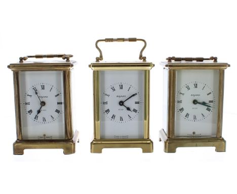 Three Bayard eight day carriage clock timepieces, within corniche brass cases (3) 